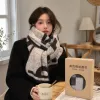 This grey and black checkered women's scarf is warm in autumn and winter, made of pure cotton, simple and versatile details Picture